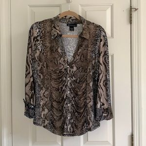 Animal print long sleeve button down with fitted bodice